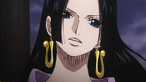 An Anime Character With Long Black Hair And Large Gold Hoop Earrings On Her Face Staring At The