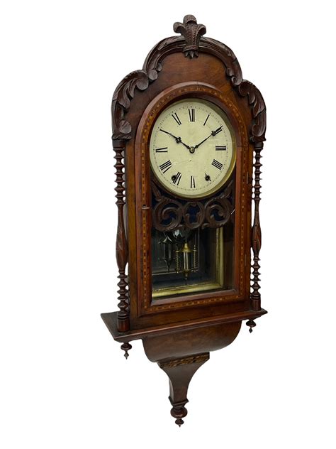 A 19thcentury American Wall Clock In A Walnut Case With Crossbanding