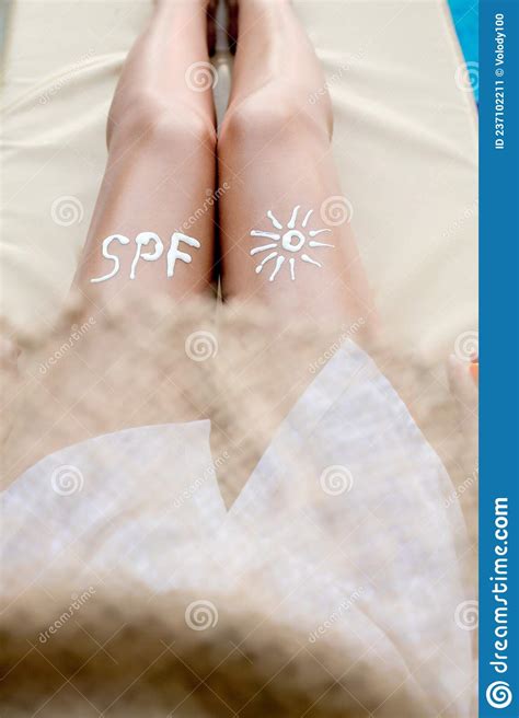 Text Spf Written With Sun Protection Cream On Legs Woman Sun Protection Suncream On Her