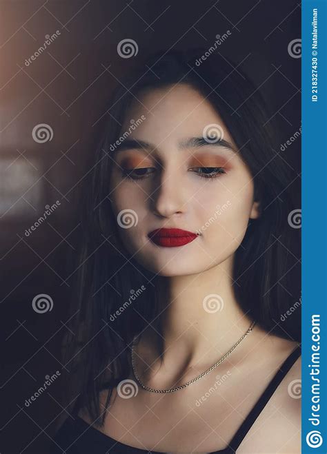 Portrait Of A Beautiful Dark Haired Girl With Red Lipstick On Her Lips Vertical Photography