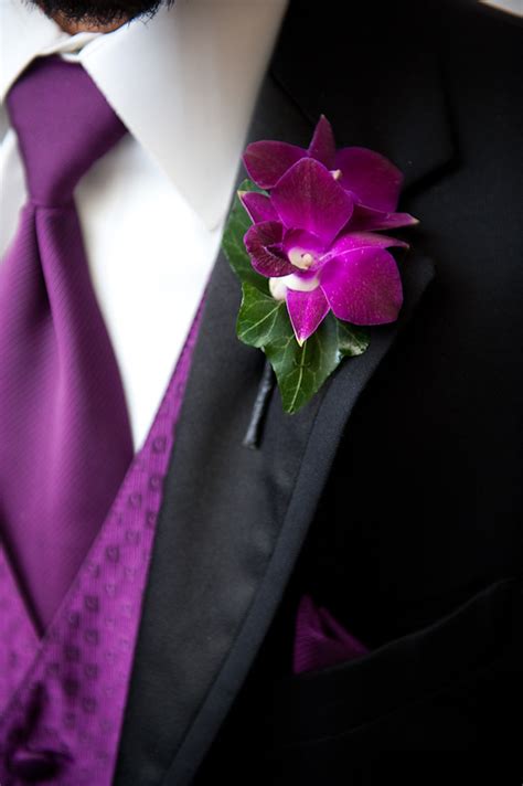 Groomsman Wearing Black Suit With Purple Vest And Tie And Purple And