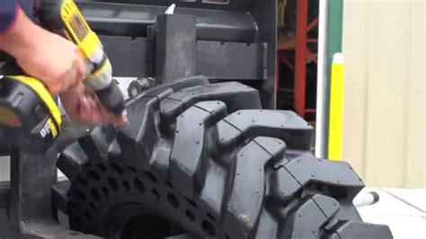 Studding Tires For Skid Steer Loader Snow Studs Youtube