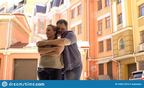 Obese Male Hugging Shy Girlfriend Trustful Couple Relationship