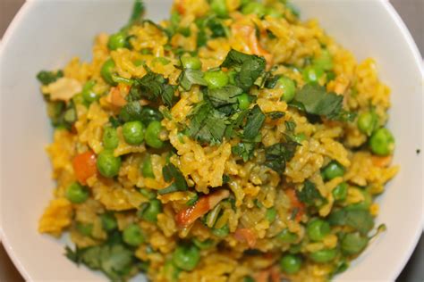 Indian Style Rice With Peas Toasted Cashews And Baby Kale Spices In