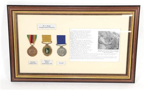 Lot 35 A Rhodesian Group Of Three Medals To Mr T