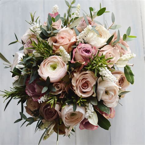 Hand Tied Spring Bridal Bouquet Of Dusky Pinks For Farnham Castle Bride