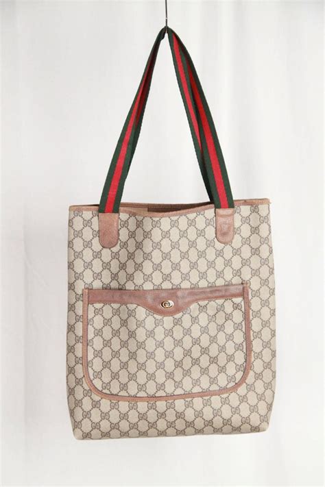 Guccis Monogram Canvas Bags Iqs Executive