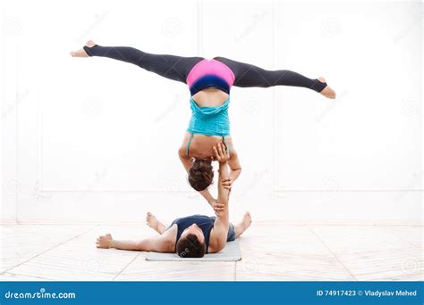 Beautiful Young Couple Practicing Acro Yoga Stock Image Image Of