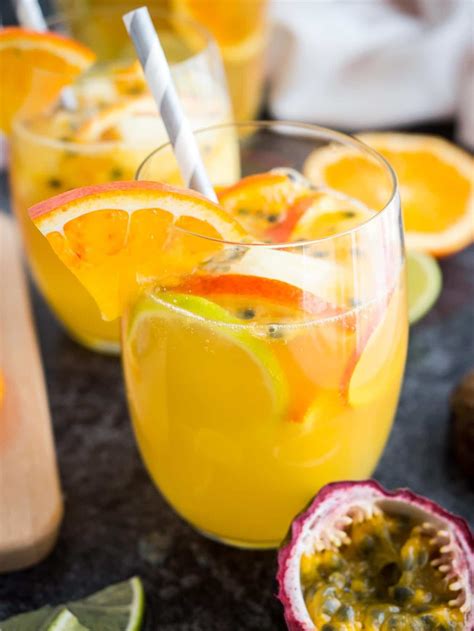 This Tropical White Wine Sangria Is The Perfect Drink For Any Occasion Fruity Bubbly And So