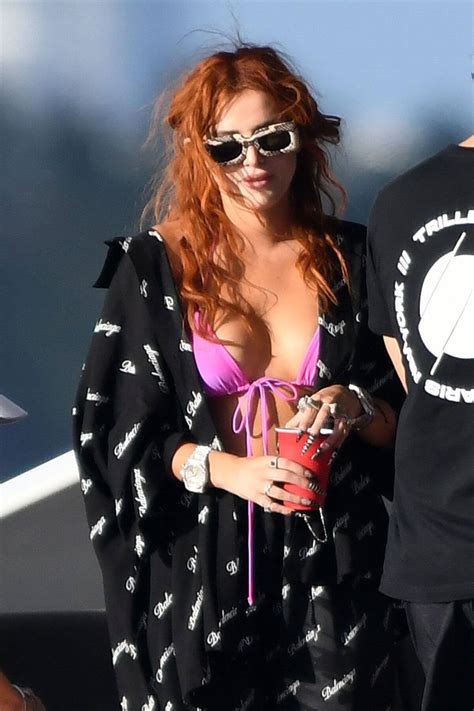 Bella Thorne Flashes Her Cleavage In Violet Bikini As She Enjoys At A Boat In Miami Beach