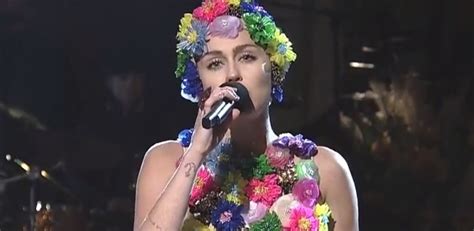 Miley Cyrus Sings Her Way Through Her SNL 2015 Monologue Watch Here