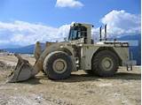 Pictures of 990 Cat Loader Specs