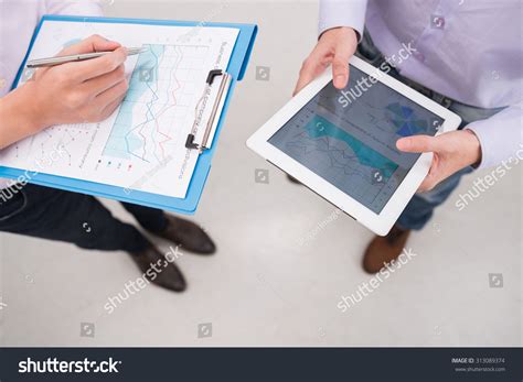 Managers Discussing Business Activity Diagram View Stock Photo