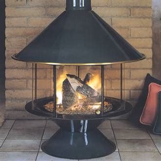 Most have cooktops for a true wood stove experience. Free Standing Wood Burning Fireplaces | NeilTortorella.com