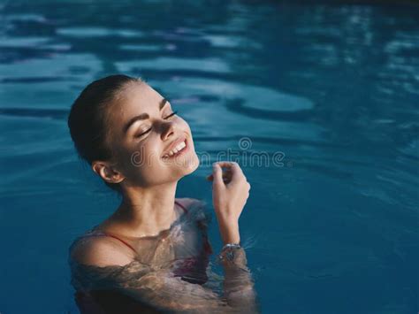 Cheerful Woman Swimming In The Pool Relaxation Enjoyment Nature Stock