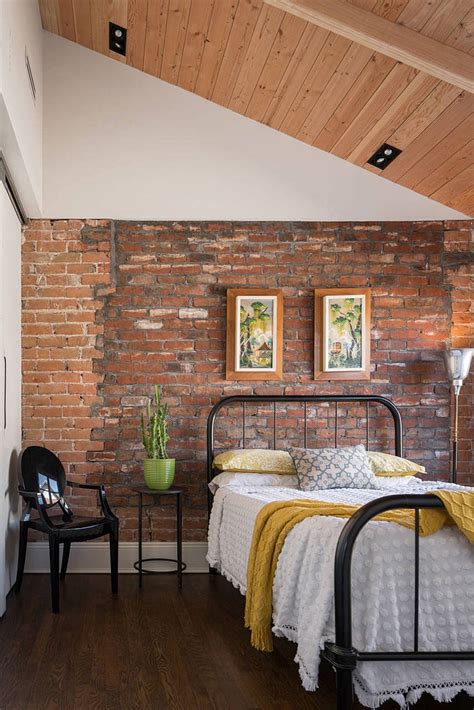 Arched windows and heart pine flooring add architectural character. Glass and Metal Addition Transforms 1920s Bungalow in Phoenix