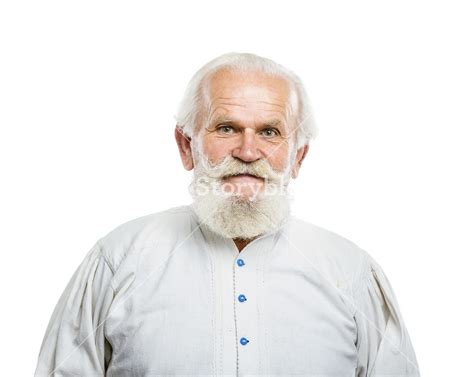 Portrait Of Old Bearded Man Posing In Studio On White Background