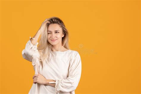 Close Up Portrait Of Young Bautiful Caucasian Girl Isolated Over Red