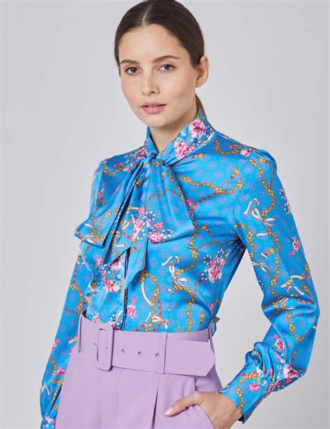 women s blue and pink floral chains fitted satin blouse single cuff pussy bow hawes and curtis