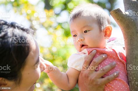 Young Japanese Mother And Baby Girl Stock Photo Download Image Now