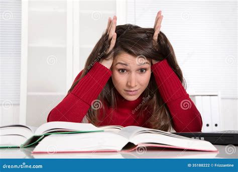 Young Businesswoman Has Concentration Problems At Studying Or At Stock