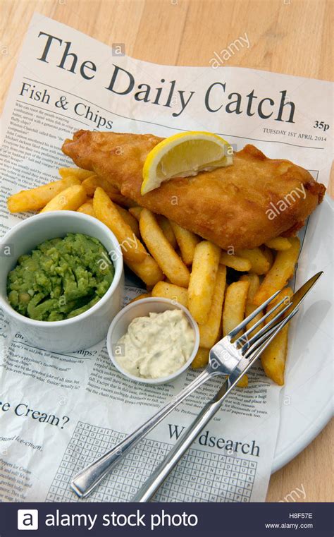 British chips are usually thickly sliced potatoes (or spuds). Traditional British fish & chips, served in a newspaper. a ...
