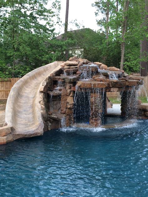 Yes, add a waterslide to it. Inground swimming pool/slide/grotto | Swimming pools ...