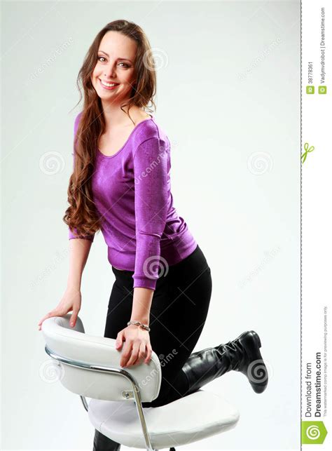 Woman With Her Knee Up On A Office Chair Stock Image Image Of