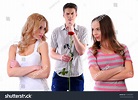 Guy Gives Flowers To Two Girls Stock Photo 122605891 ...