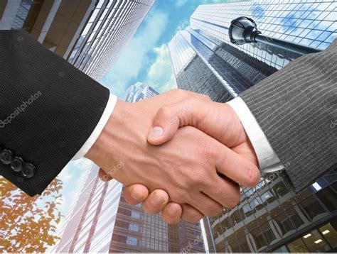 Business Agreement Handshake Stock Photo By ©billiondigital 118564432