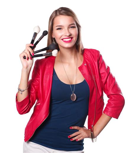 Young Beautiful Woman Holds In Hand Brush For Makeup Stock Image