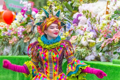 Clowness In A Bright Costume On The Procession `flower Festival