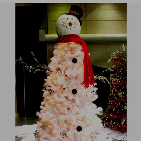 Another idea can be drawing a snowman on an old shutter and place it outside. Frosty the Snowman Tree | Christmas tree themes, Snowman ...