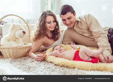 Naked Baby With Her Parents Stock Photo By Okskukuruza