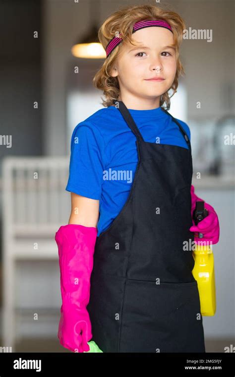 Kid Helping With Housework Child Use Duster And Gloves For Cleaning