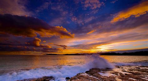 Photography Nature Sea Rocks Sky Sunset Waves Hills Wallpapers