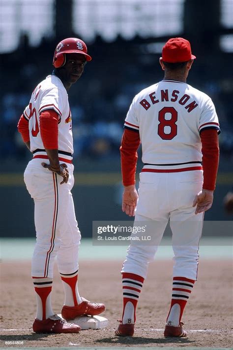 Lou Brock Of The St Louis Cardinals Stands On Base And Talks With