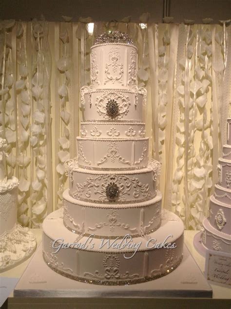 A gorgeous wedding cake is often the centerpiece of a wedding and typically sits in a place of honor at the reception. Extravagant huge Royal Iced Wedding Cake by Garrods ...