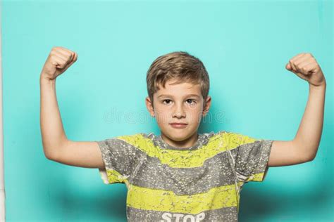 Child With Arms Raised On Biceps Stock Photo Image Of Male Child