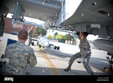 The 124th Aircraft Maintenance Squadron Crew Chiefs Install A