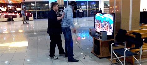 A Bunch Of People Wearing Oculus Rifts And Falling On