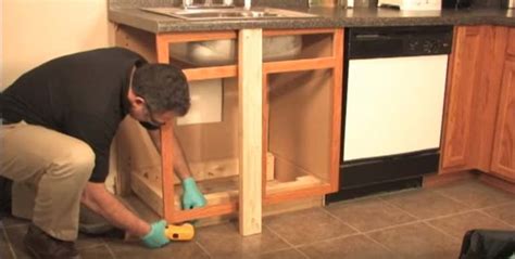 Shut off any interior water sources. How to Repair Water Damaged Kitchen Cabinets? - For Comfy Home