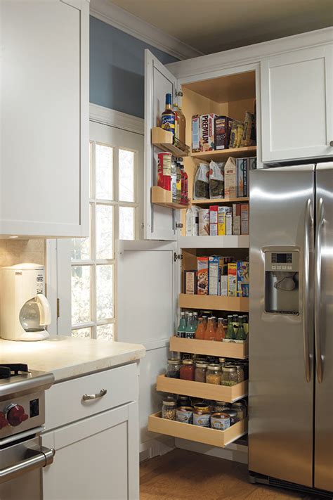 A slim pantry cabinet is a brilliant way to utilize what might seem like an unusable area. Cabinet Organization Products - Aristokraft Cabinetry