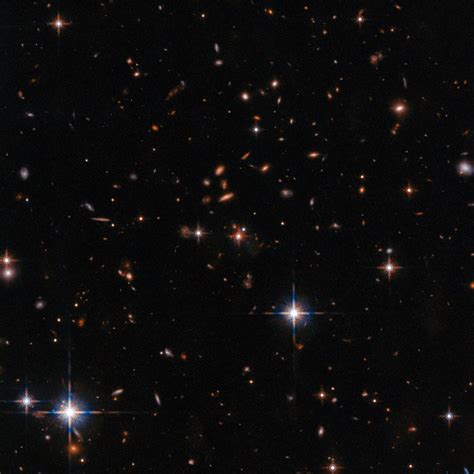 Wide Field Hubble View Of Extremely Red Quasar Sdss J165202641728523