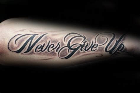 60 Never Give Up Tattoos For Men Phrase Design Ideas