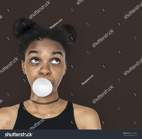 African Woman Blowing Bubble Gum Playful Stock Photo Edit Now 630319055