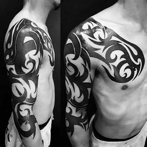 This tribal tattoo is a fascinating expression of artistics design. 50 Badass Tribal Tattoos For Men - Manly Design Ideas