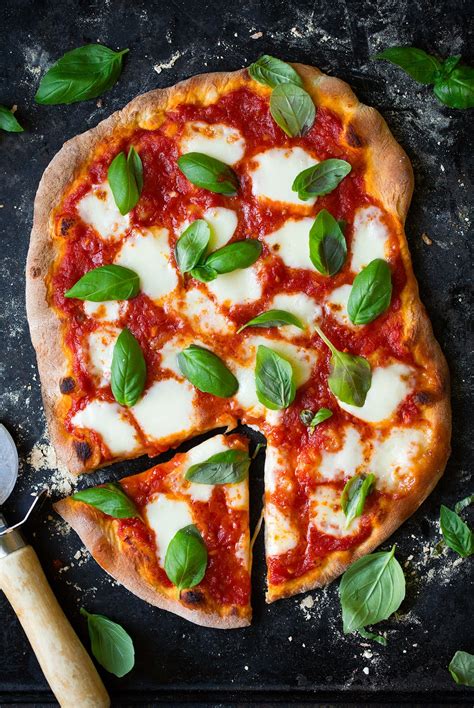 This easy margherita pizza recipe is as good as the authentic one from italy — but without the hassle. Margherita Pizza (Easy Delicious Recipe!) - Cooking Classy