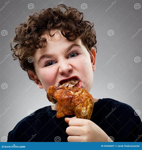 Kid Eating Chicken Leg Stock Image Image Of Drumsticks 55646847