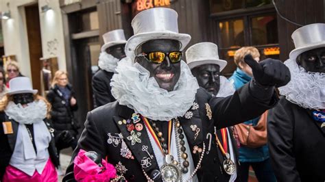 The White Belgians Parading Through Brussels In Blackface